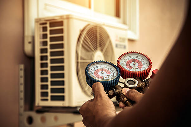 Professional Hvac technician working in Cantua Creek, CA